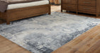 Langrich 7'10" x 10'6" Rug - Bargain Furniture (Detroit, MI)