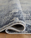 Langrich 7'10" x 10'6" Rug - Bargain Furniture (Detroit, MI)
