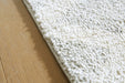 Unawick Large Rug - Bargain Furniture (Detroit, MI)