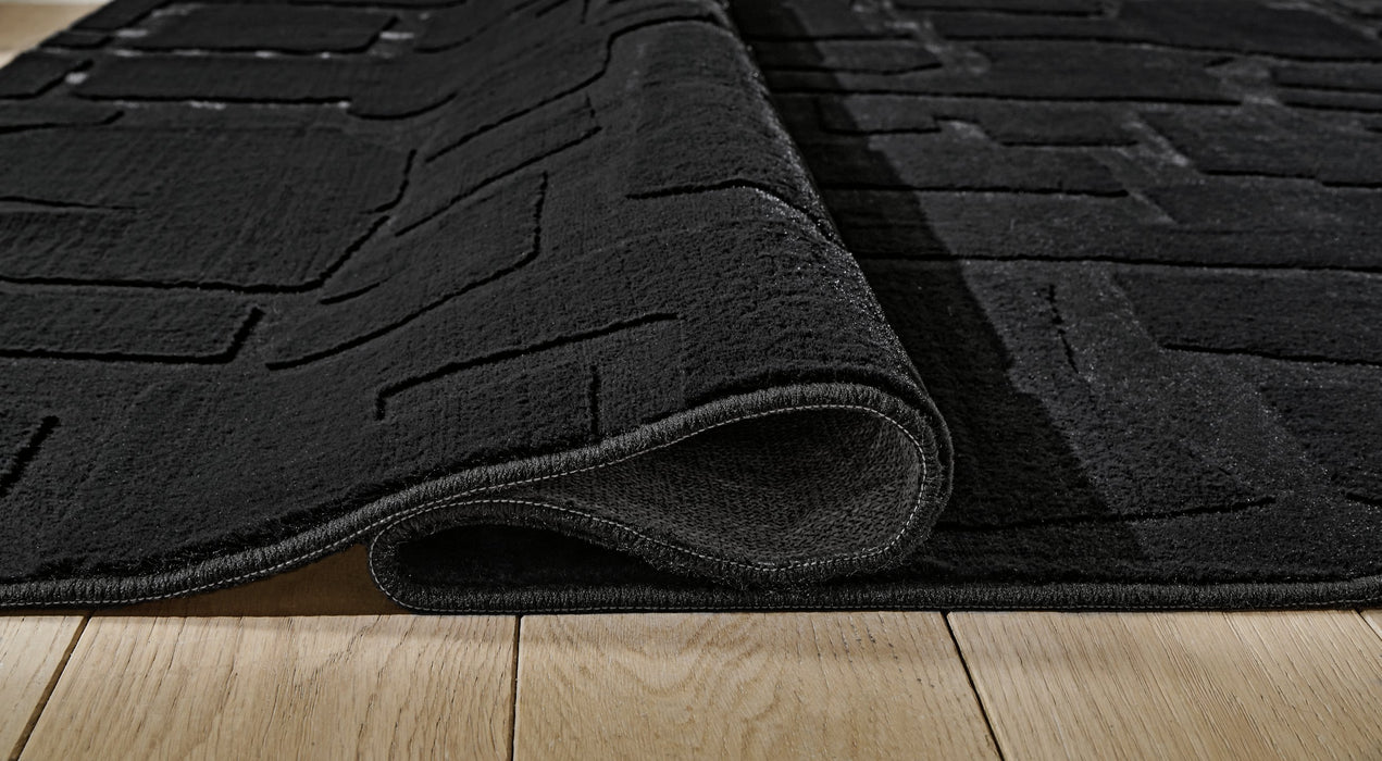 Gibbswell Washable Area Rug - Bargain Furniture (Detroit, MI)