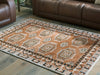 Qaabiz Area Rug - Bargain Furniture (Detroit, MI)