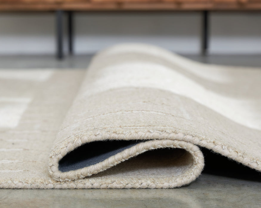 Wolbert 7'8" x 10' Area Rug - Bargain Furniture (Detroit, MI)